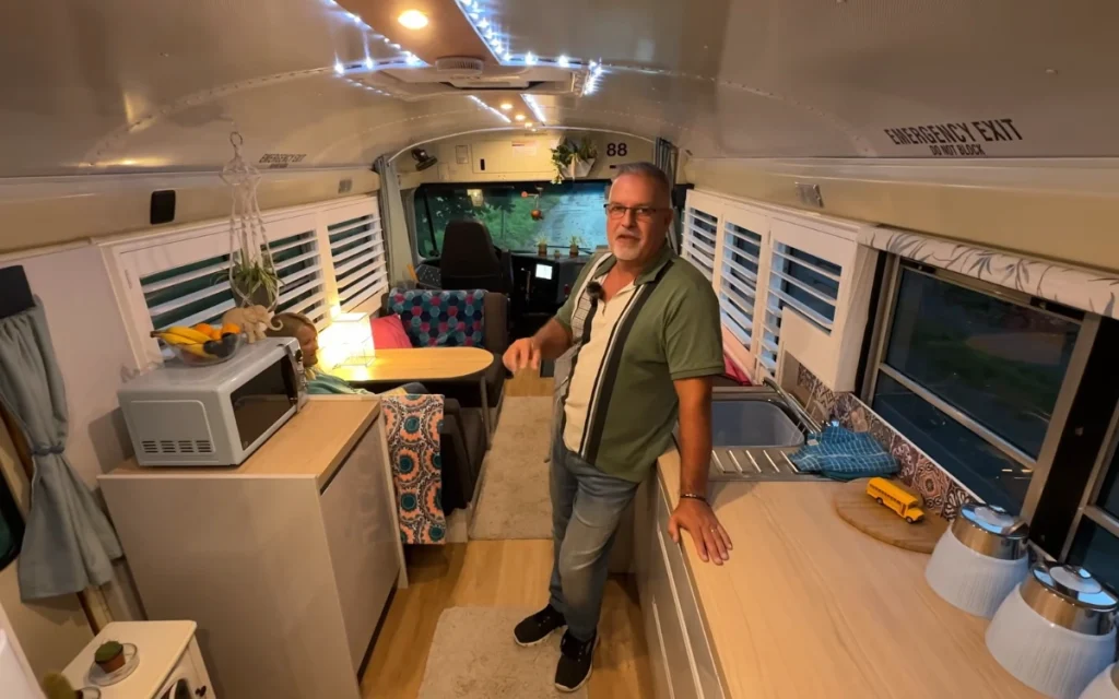 An American school bus reborn as a tiny home might sound quirky, but this English couple made it feel surprisingly practical.