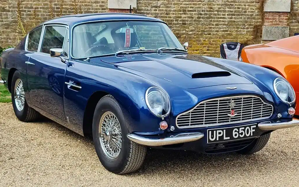 King Charles' Aston Martin DB6 sports car runs on cheese and wine