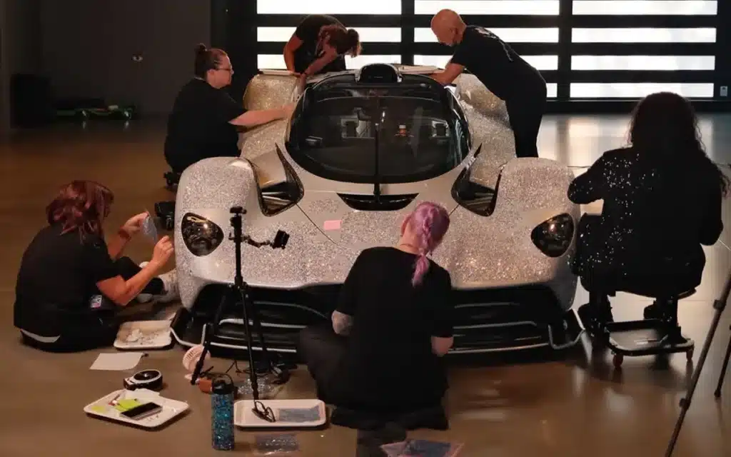 This $4M bedazzled Aston Martin Valkyrie Spider, owned by a Utah millionaire, took 12 people, 300,000 hand-laid gems, and 1,500 hours to craft