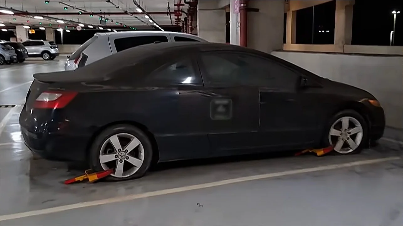 Rare car mysteriously abandoned at one of the world's largest airports for six years has racked up a huge amount of debt in parking tickets