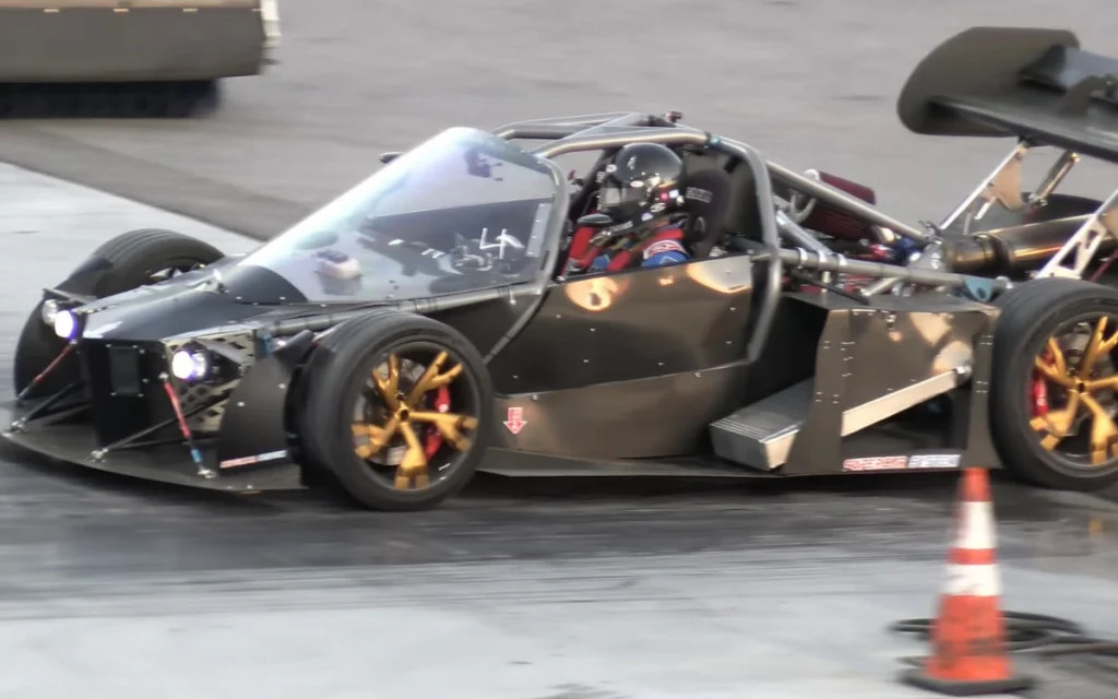 Prototype exoskeleton hypercar B2 Spirit can’t outrun stock Tesla Model 3 in quarter‑mile