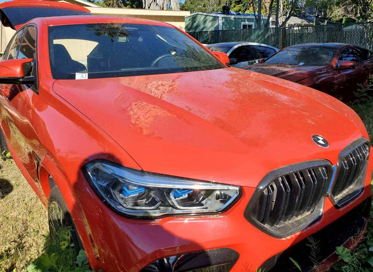 A red BMW is pictured.