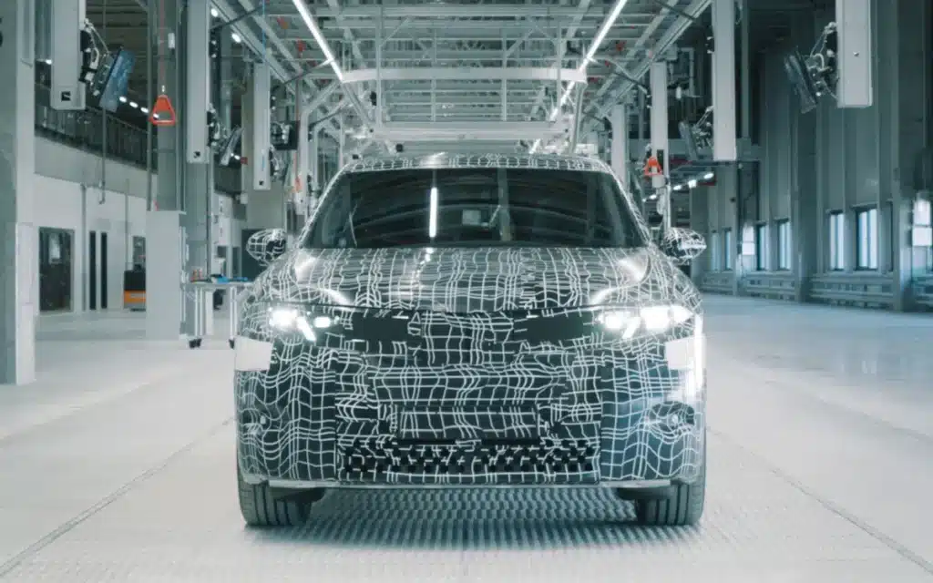 A BMW iX3 concept just pulled up to get its tires changed in Birmingham