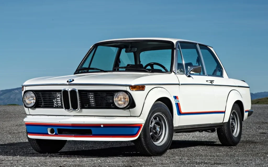 The new 2026 BMW M2 Turbo Design Edition is a perfect retro‑inspired throwback to its golden age, mimicking the same blue and red on white palette