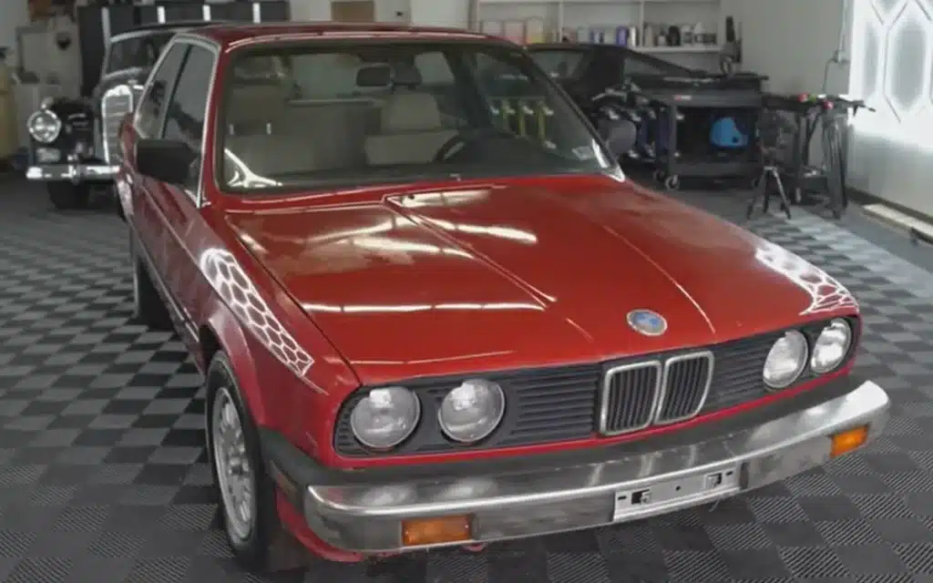 Abandoned BMW E30 gets first clean in 30 years