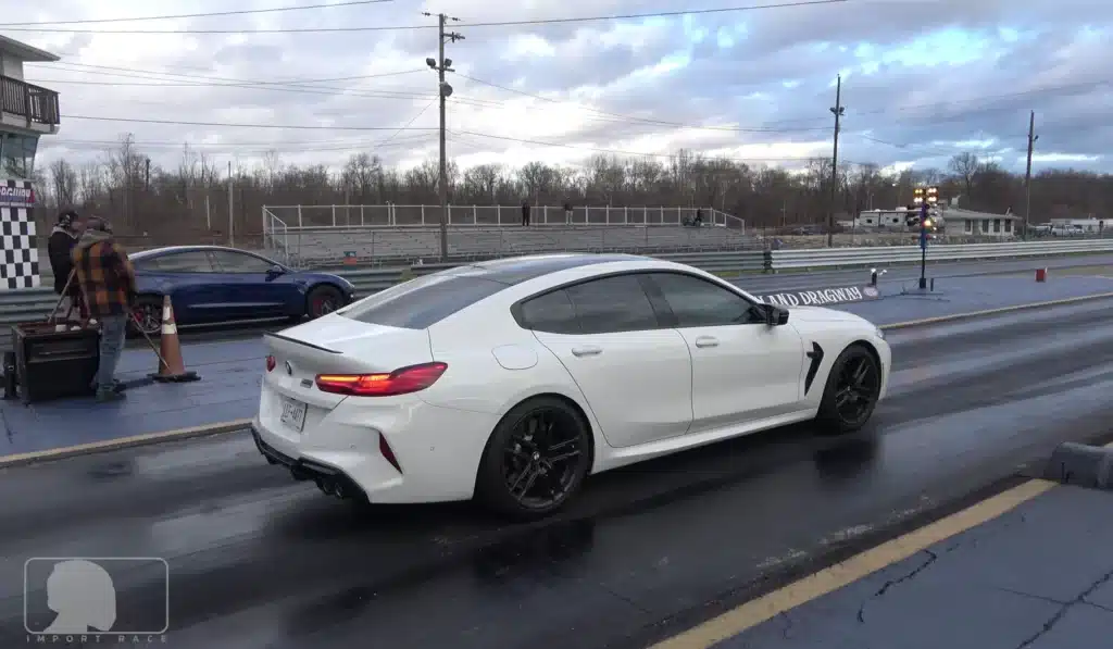 BMW M8 drag race Tesla Model 3 Performance