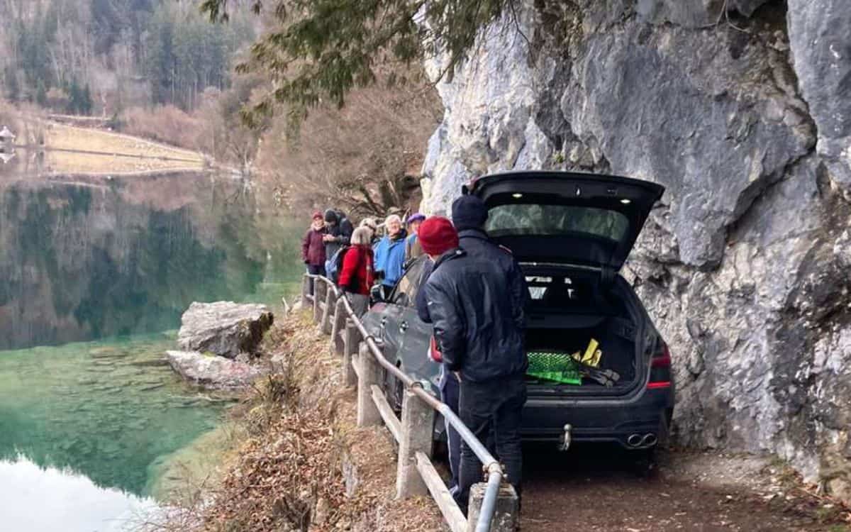 BMW driver gets car stuck on hiking trail