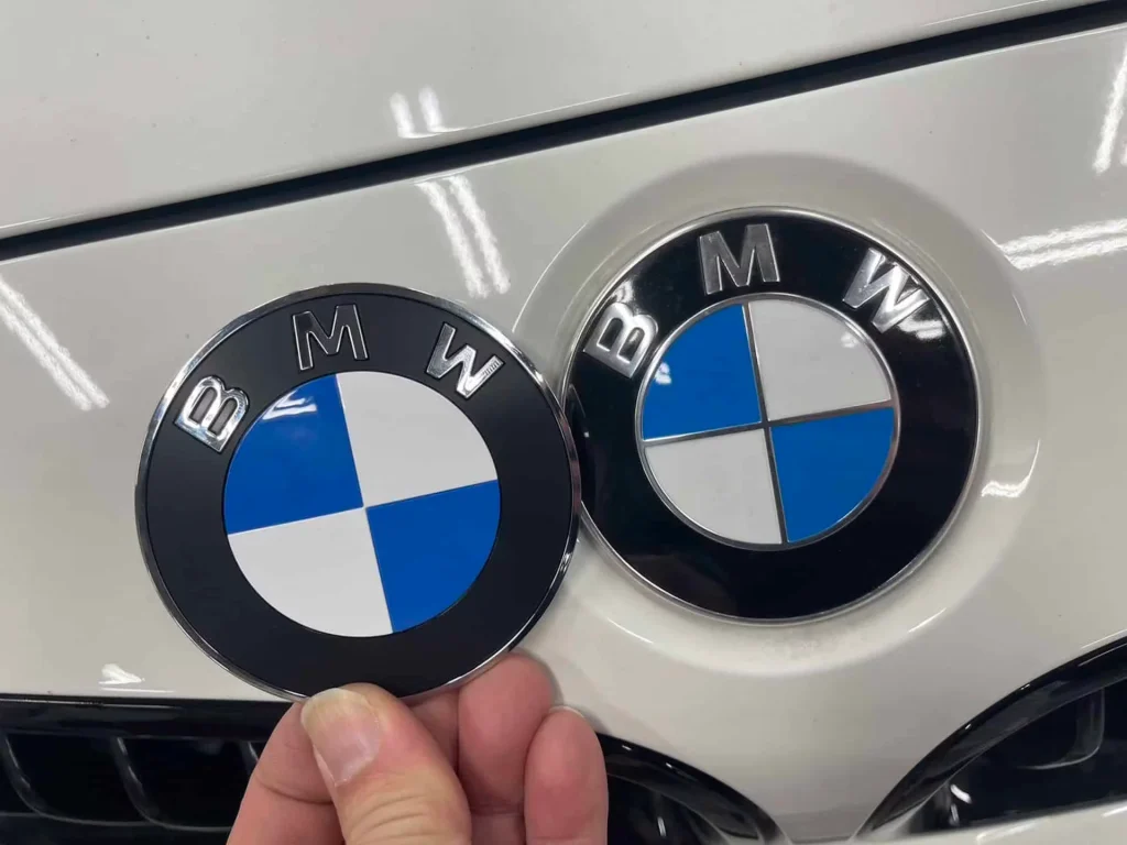 BMW is going to start fitting its updated and new look roundel on new cars next month