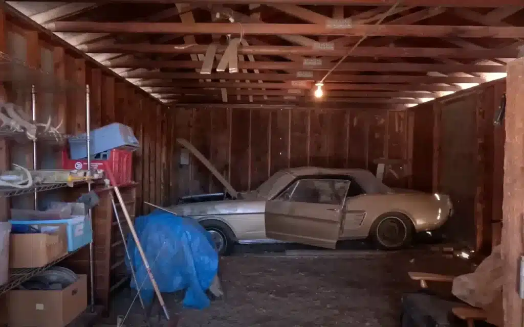 Barn needed to be dismantled to rescue a classic Mustang parked since the early 80s