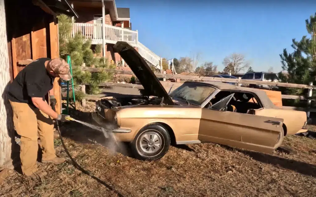 Barn needed to be dismantled to rescue a classic Mustang parked since the early 80s