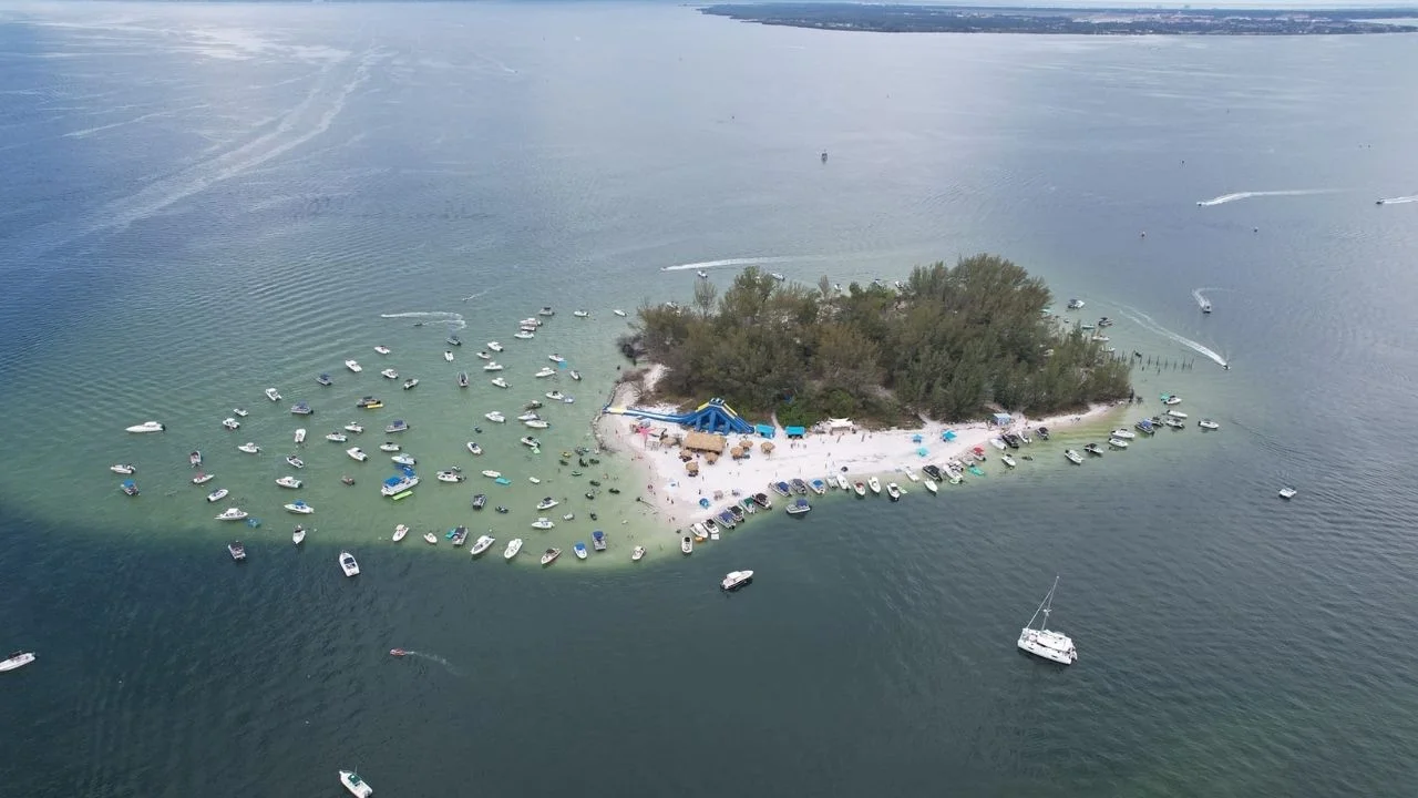 Four friends pooled money together to buy deserted Florida island for $65,000 and transformed it into a paradise worth $14M with an iconic name