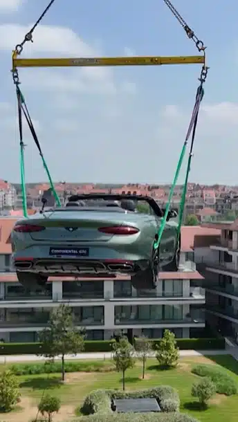 $420k Bentley craned to rooftop of Michelin-starred chef's restaurant for unique dining experience