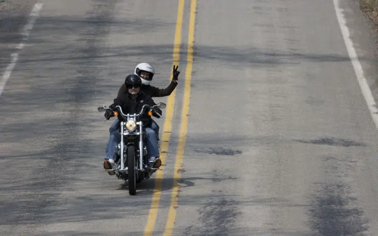 A motorcyclist and their hand signals can be the difference between life or death. Here's what it means when a motorcyclist points up towards the