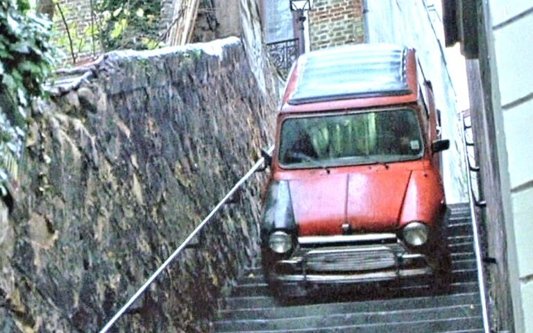 The red Mini bounces down stairs in Paris during a car chase in The Bourne Identity.