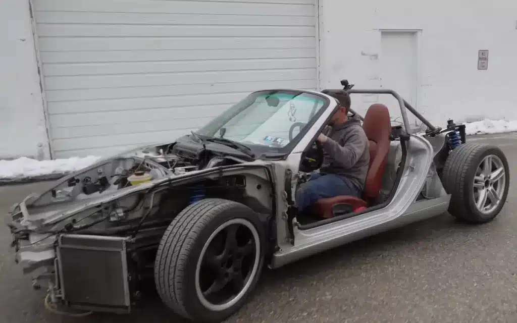 This $500 junkyard Porsche Boxster is being warped into a custom '60s supercar in a year-long project by a Pennsylvania garage