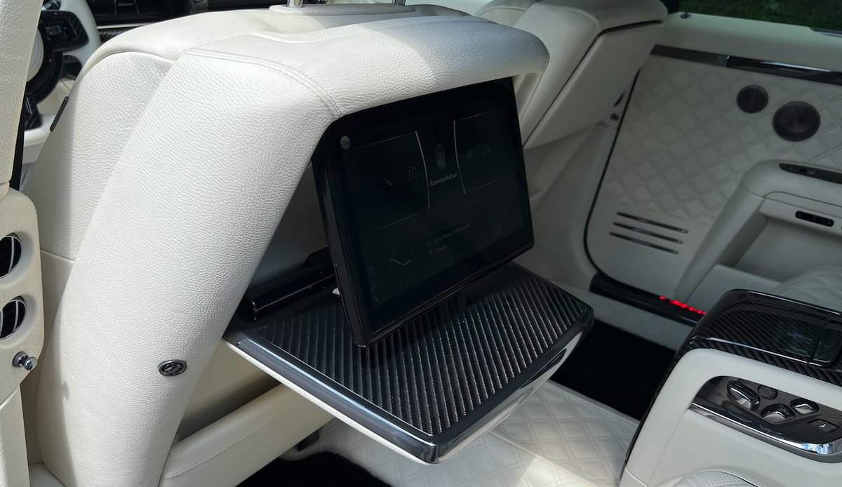 Tv screen and table in the Rolls-Royce Ghost