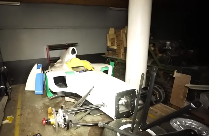 Guys dropped from great height to get into secret underground facility and in there found valuable car hoard that included an F1 car