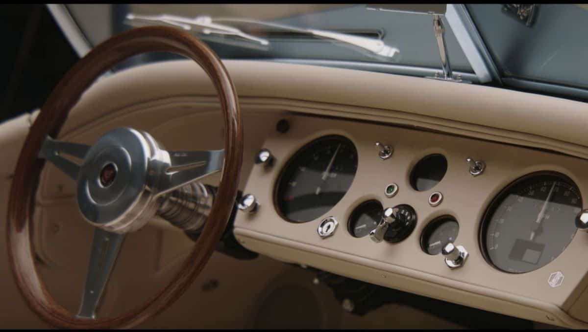 The steering wheel and dashboard.