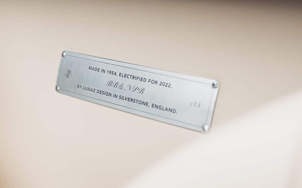 A plaque inside the car reads: "Made in 1954. Electrified for 2022. BB & NPB. By Lunaz Design in Silverstone, England.