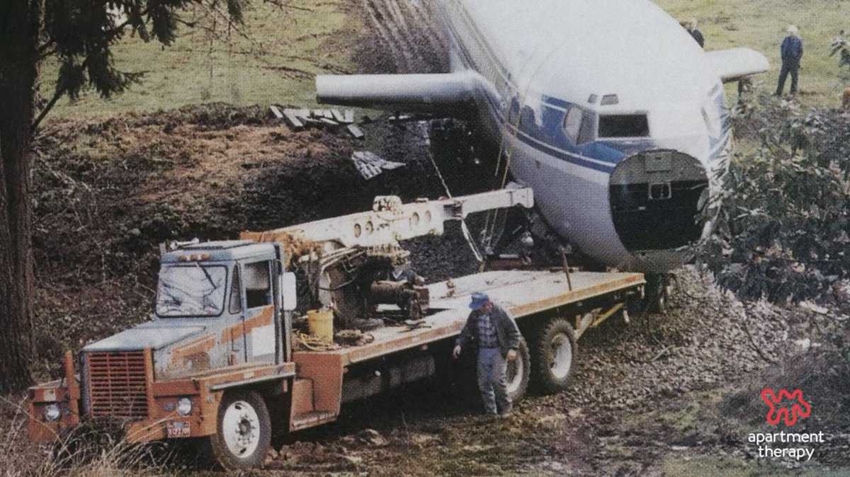 The plane being towed by truck