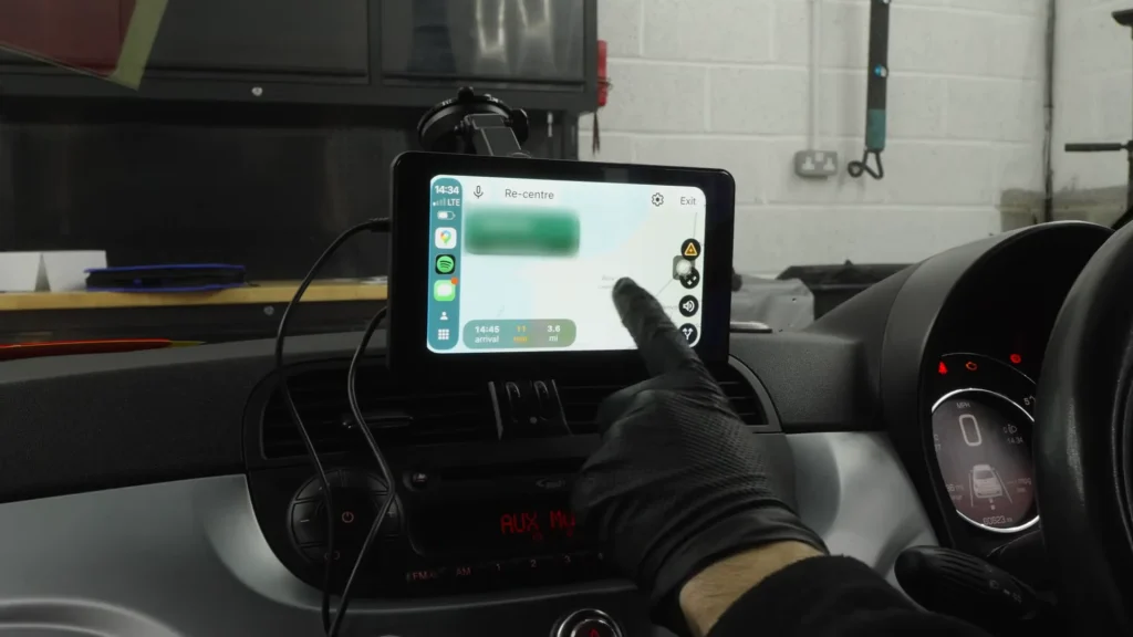 Men try out a $46 cheap Apple CarPlay and Android Auto adapter to see if it's better than expensive alternatives