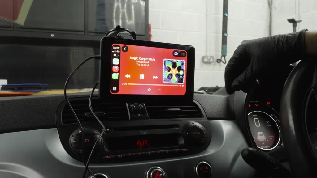 Men try out a $46 cheap Apple CarPlay and Android Auto adapter to see if it's better than expensive alternatives