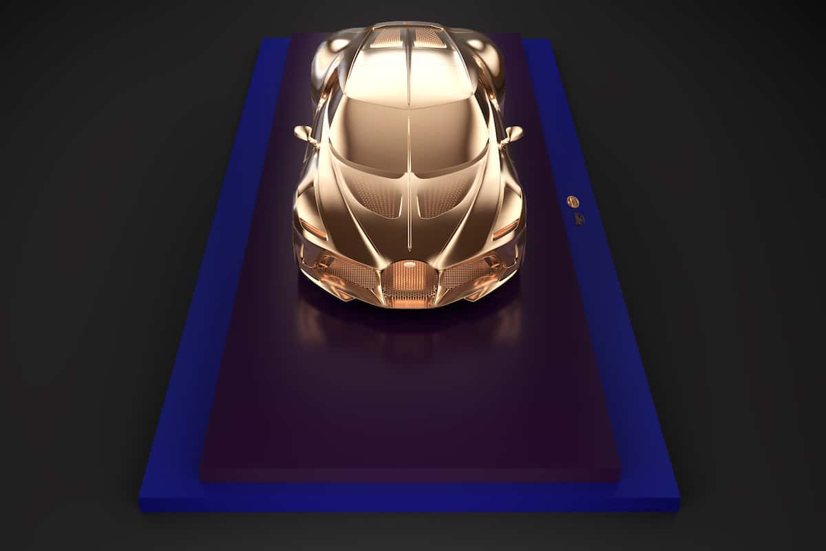 Asprey's Bugatti La Voiture Noire gold sculpture accompanying a unique NFT