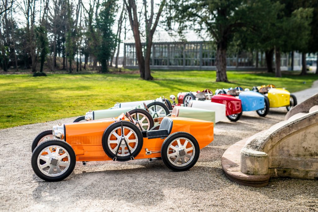 The Bugatti Baby IIs lined up in a row.