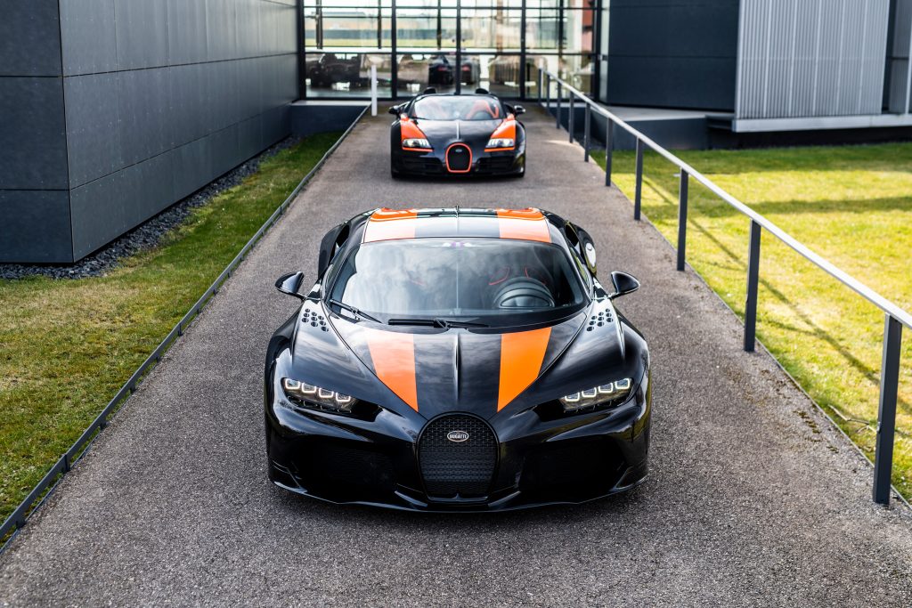 The Chiron Super Sport 300+ with the Veyron in the background.