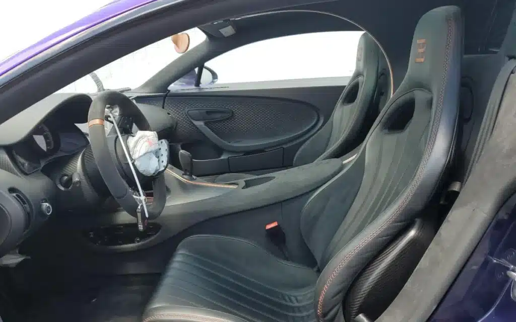 After spotting this crash-damaged 1-of-60 Bugatti Chiron Pur Sport on Miami Copart, restoration expert Mat Armstrong breaks down the price of replacing two headlights