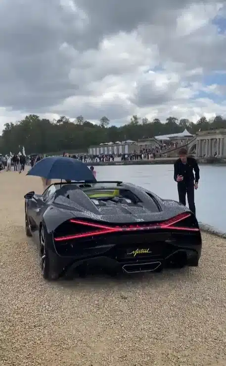 This Bugatti was made for sunshine but someone took it out with a umbrella instead