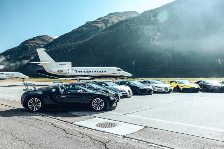 Bugattis parked on airport runway