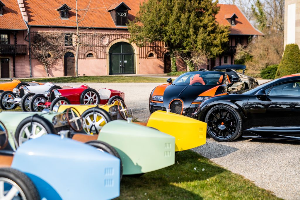 All eight Bugattis in one photo.