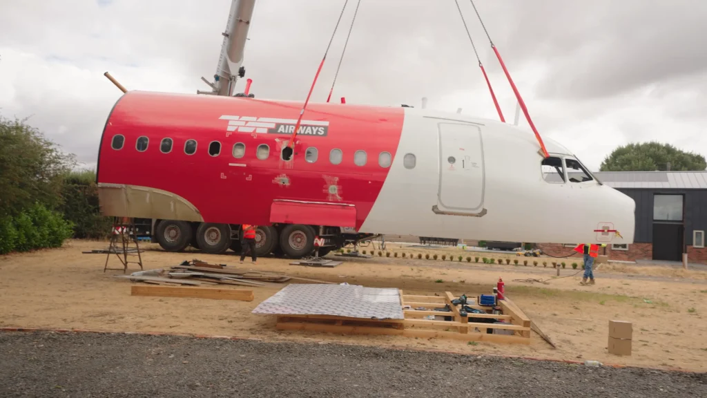 YouTubers bury themselves underground in a real Boeing 747 and have to try and escape