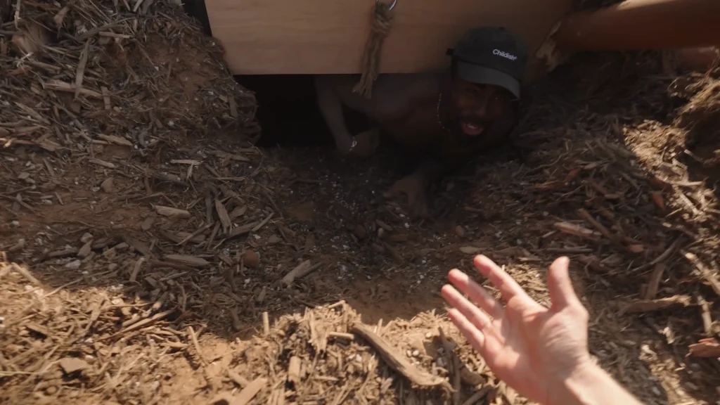 YouTubers bury themselves underground in a real Boeing 747 and have to try and escape