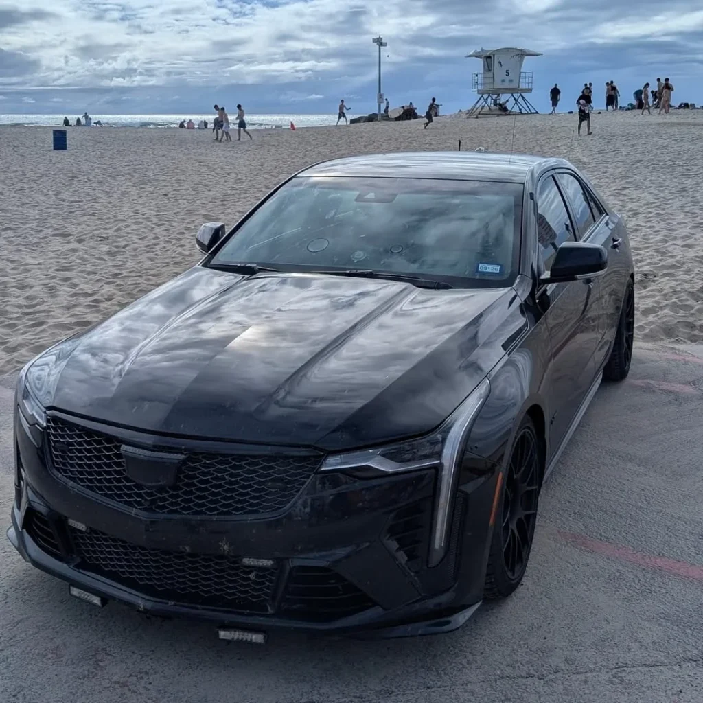 Driver who set new Cannonball Run coast-to-coast record in 22 hours shows off the incredibly cracked out Cadillac CT4-V Blackwing he pulled it off in