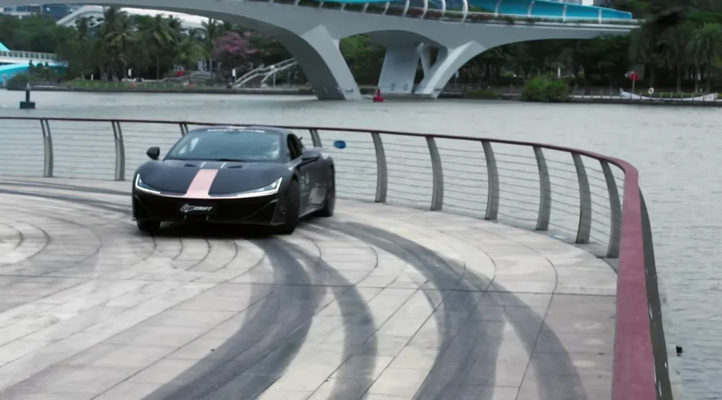 Chinese performance EV with 1,224HP broke the drift world record in the most aggressive way possible as it launched completely airborne before drifting