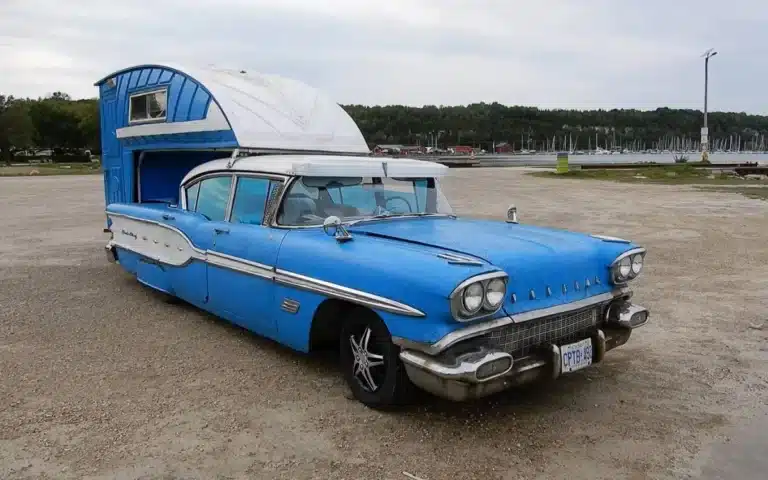 Pontiac with Hitchhiker camper looks like mobile Porta Potti