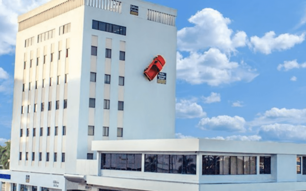 This Chevy pickup has been stuck on a building for 30 years