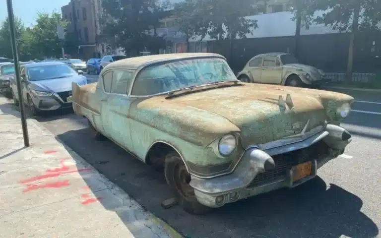 A Brooklyn garage closed and three classic cars were found