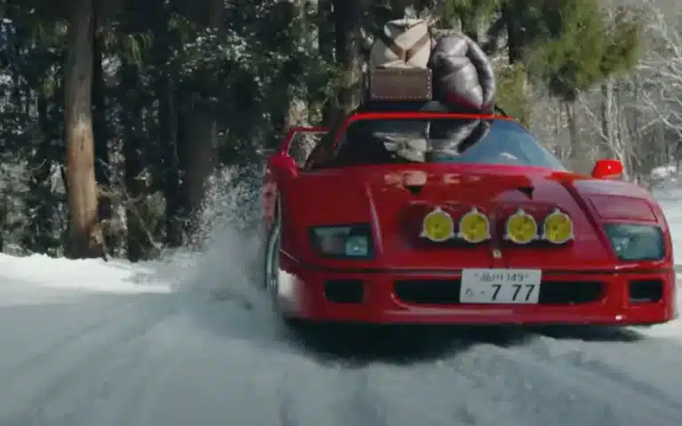 Ferrari F40 supercar drifting off-road at snowy Japan Ryuoo Ski Park