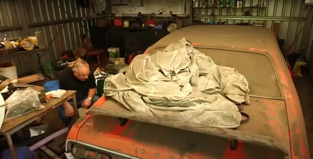 Rare muscle car stored for three decades needed to be craned 30 feet up in the air to be saved