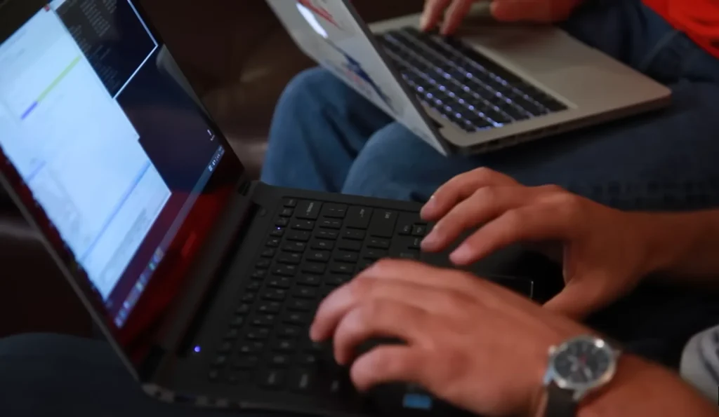 Man drives a Jeep down a highway while two hackers remotely attack it from miles away to show what the experience is like