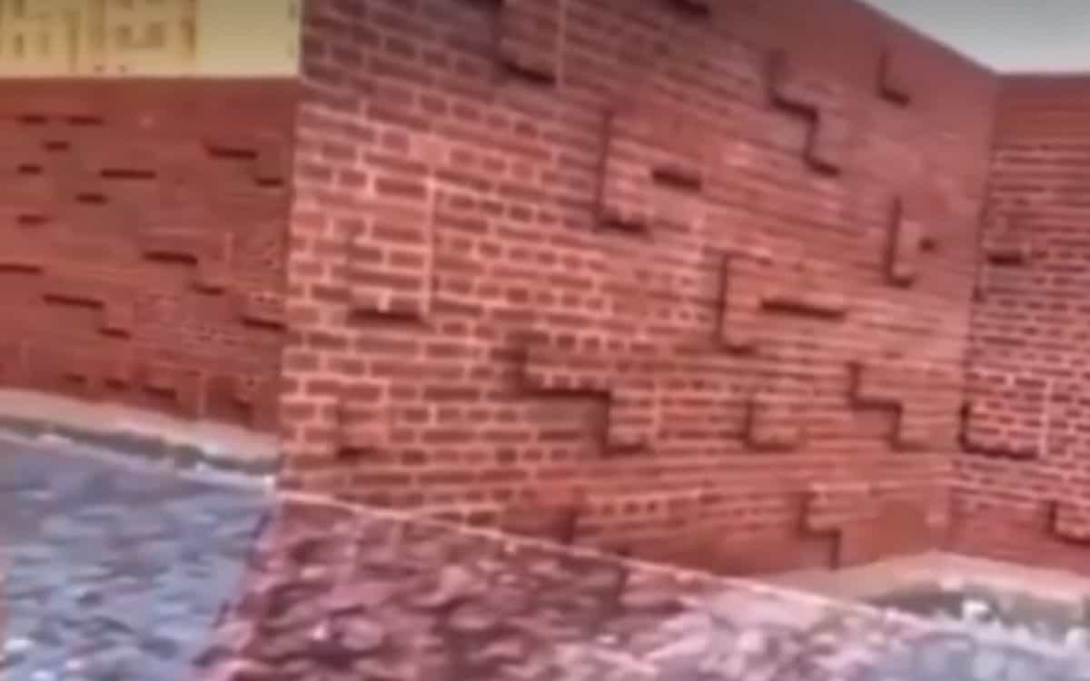 Surprise! There's a path leading through the brick wall.