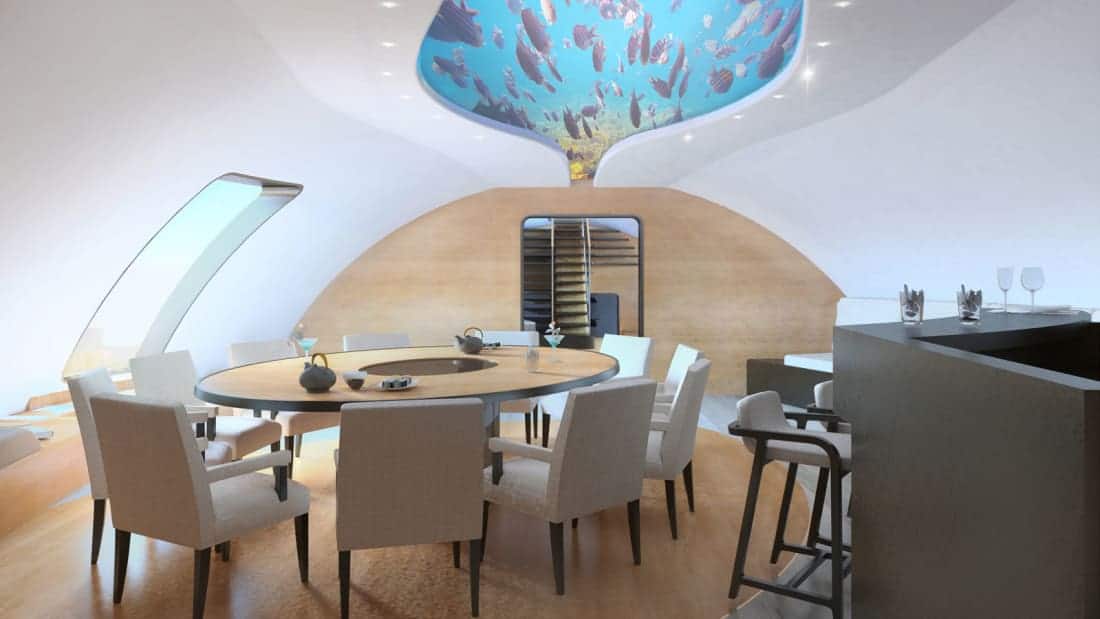 Carapace superyacht dining table with underwater views