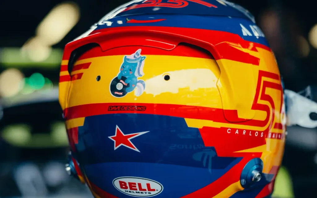 A fan-designed unicorn sticker has proved to be a good luck charm for Carlos Sainz, so here's why it was riding shotgun on his helmet in the F1 Baku Grand Prix