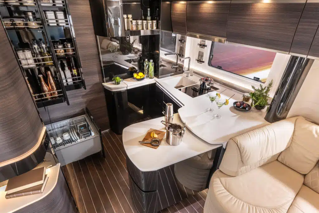This $1.2M land yacht by Concorde Centurion is a luxury motorhome built on a Mercedes Actros chassis, complete with a car garage and yacht-inspired design
