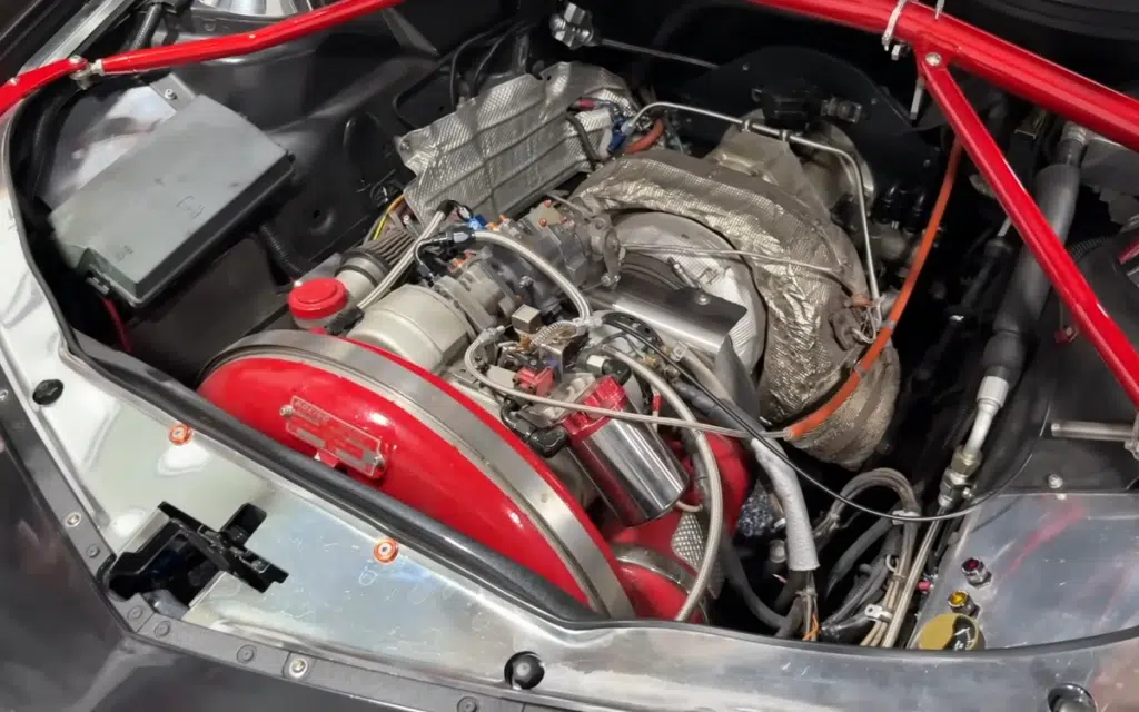 fifth-gen camaro muscle car with boeing T50 turbine engine under the hood