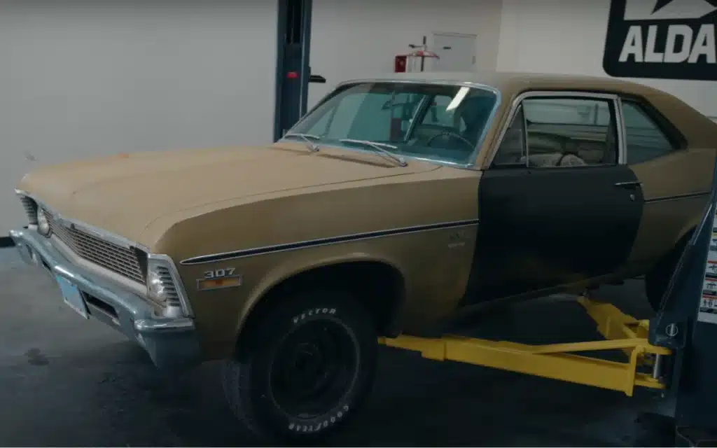 Abandoned Chevrolet Nova damaged door