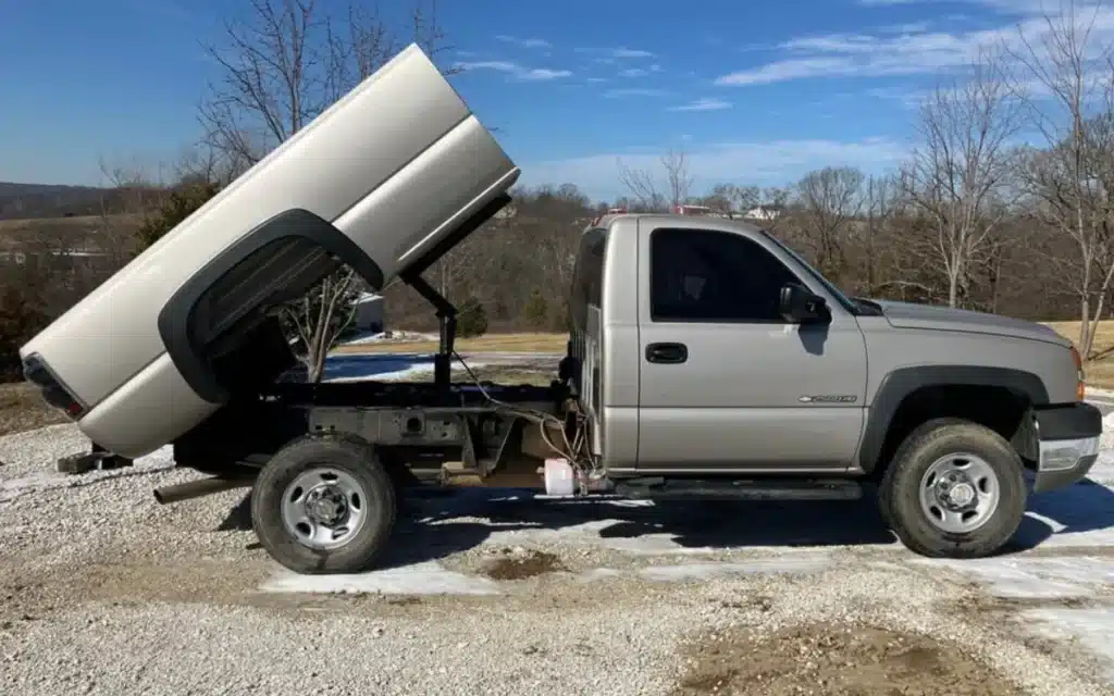 The modified Chevy Silverado GMT800 with its dump bed feature.